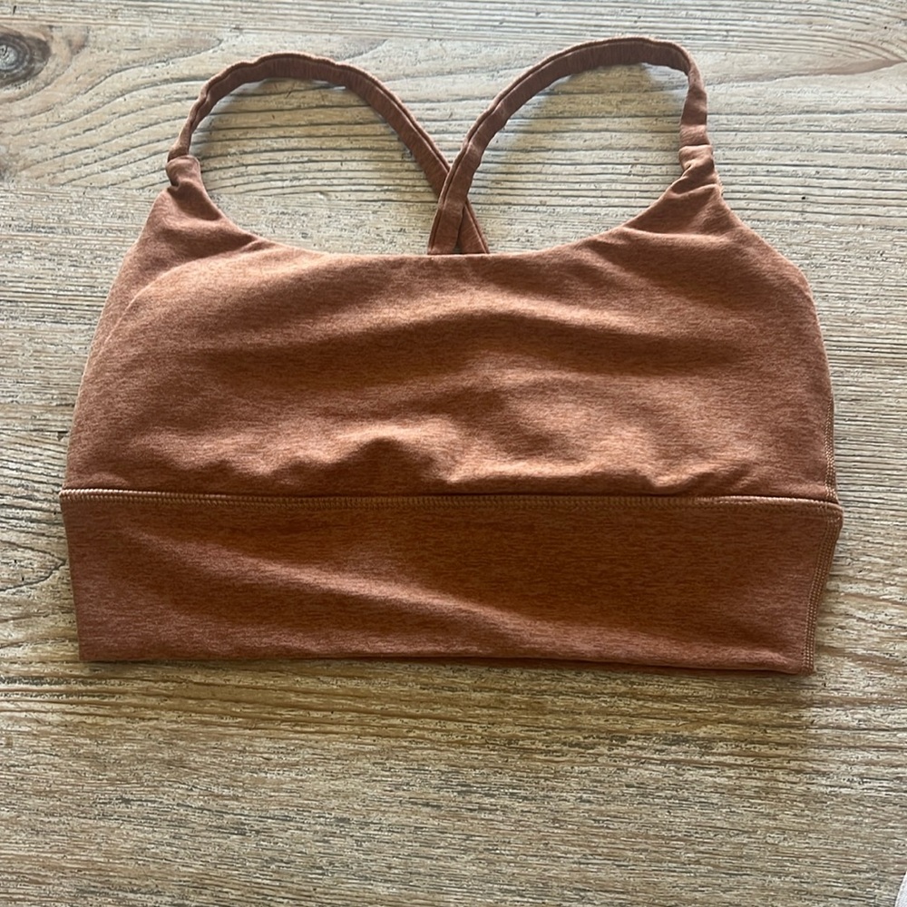 Vuori Bra
Color- Orangish Tan
Support- Medium
Size- Unknown- a Small i’d assume